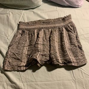 Green flowy print shorts